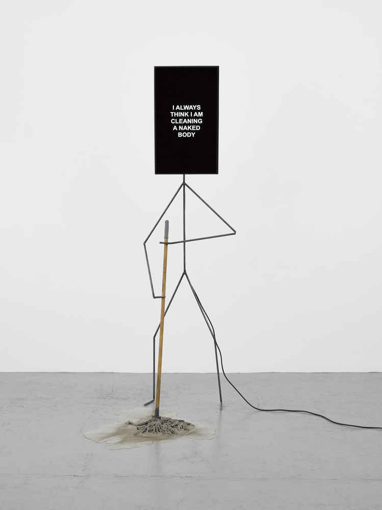 Metal Man cleaning the floor